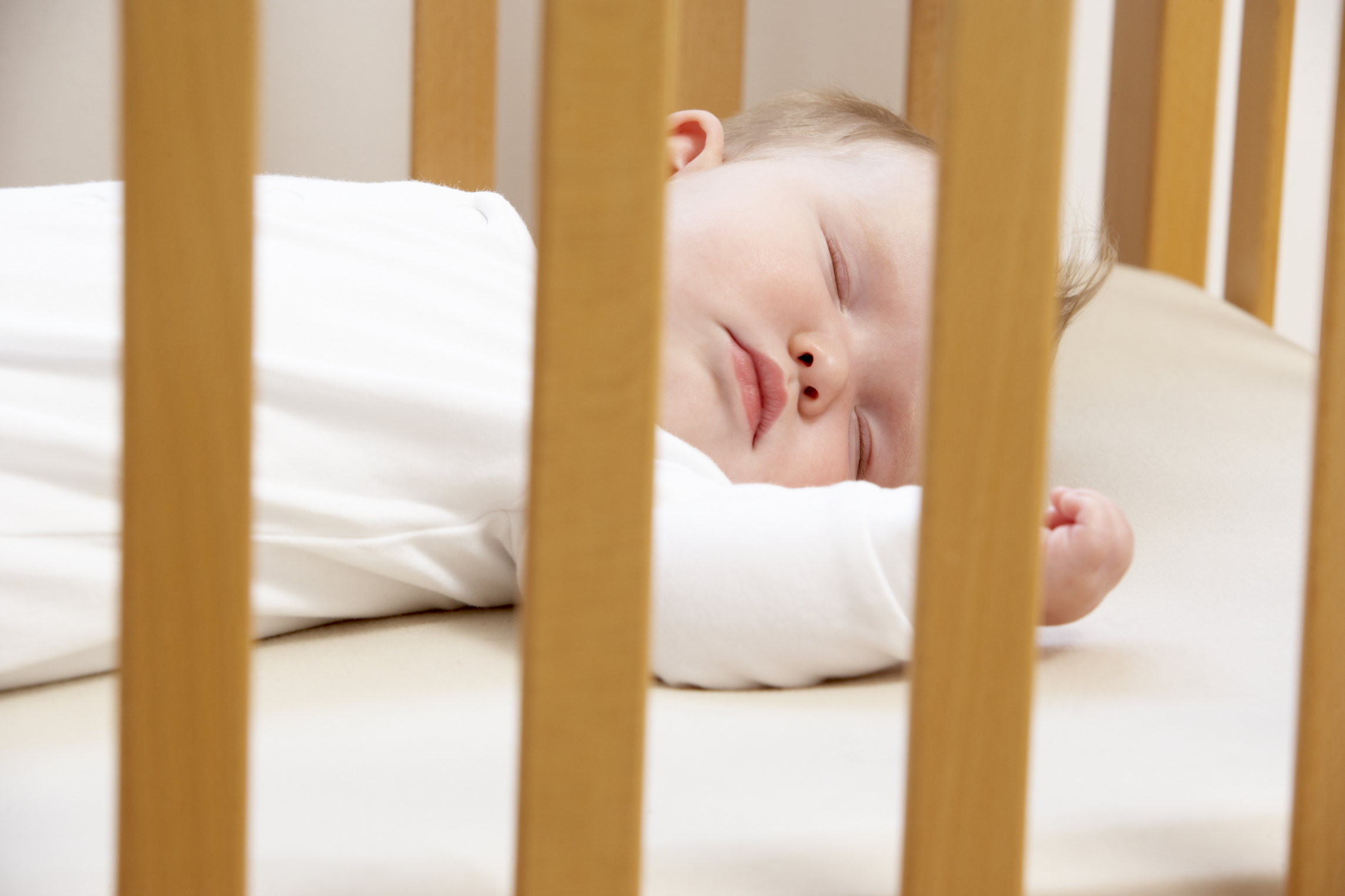 Newborn Baby In Cot